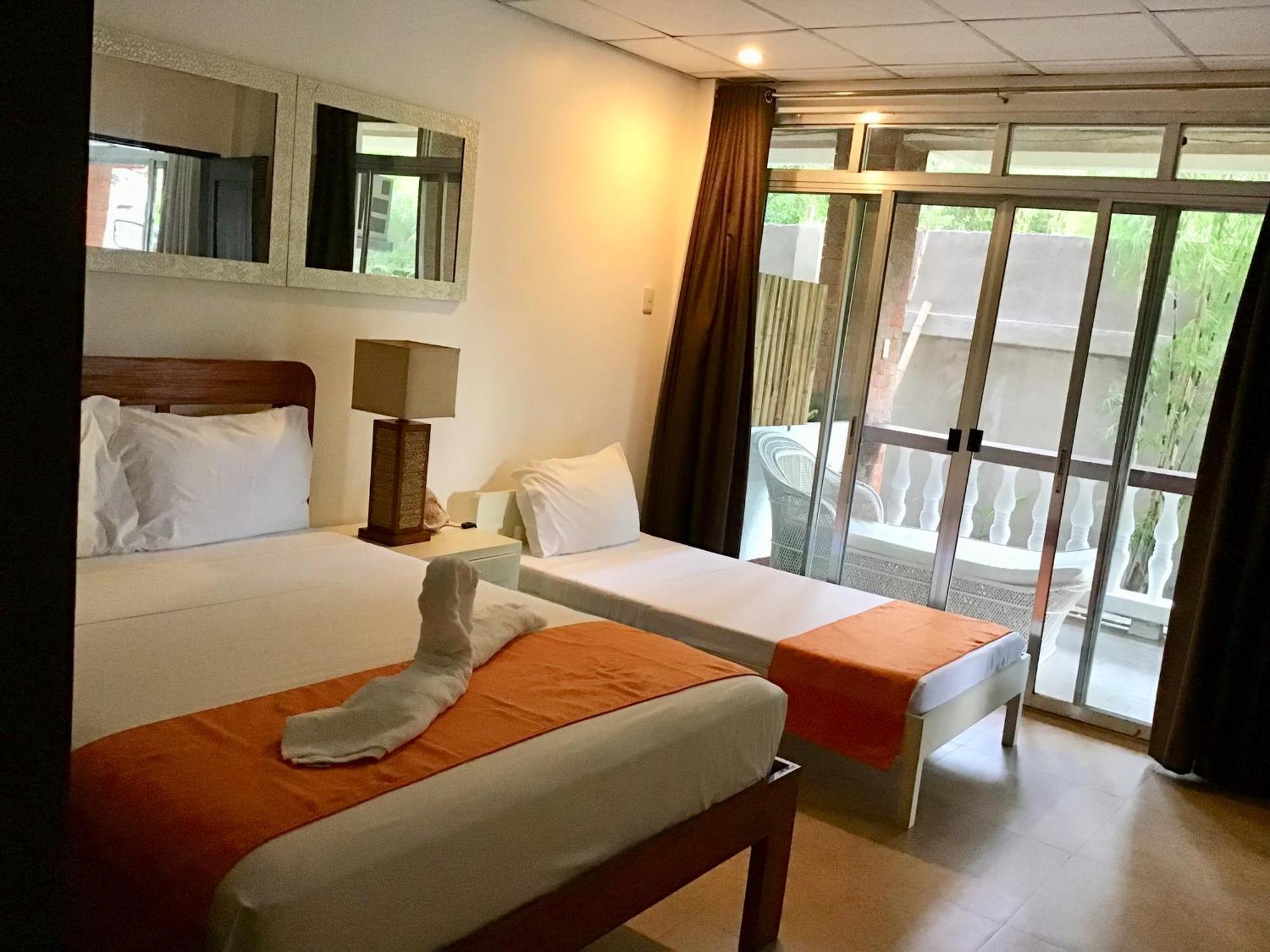 1888 Beach Resort Dumaguete City Bagian luar foto